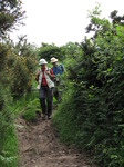 SX06882 Machteld and Hans walking down slippery trail.jpg